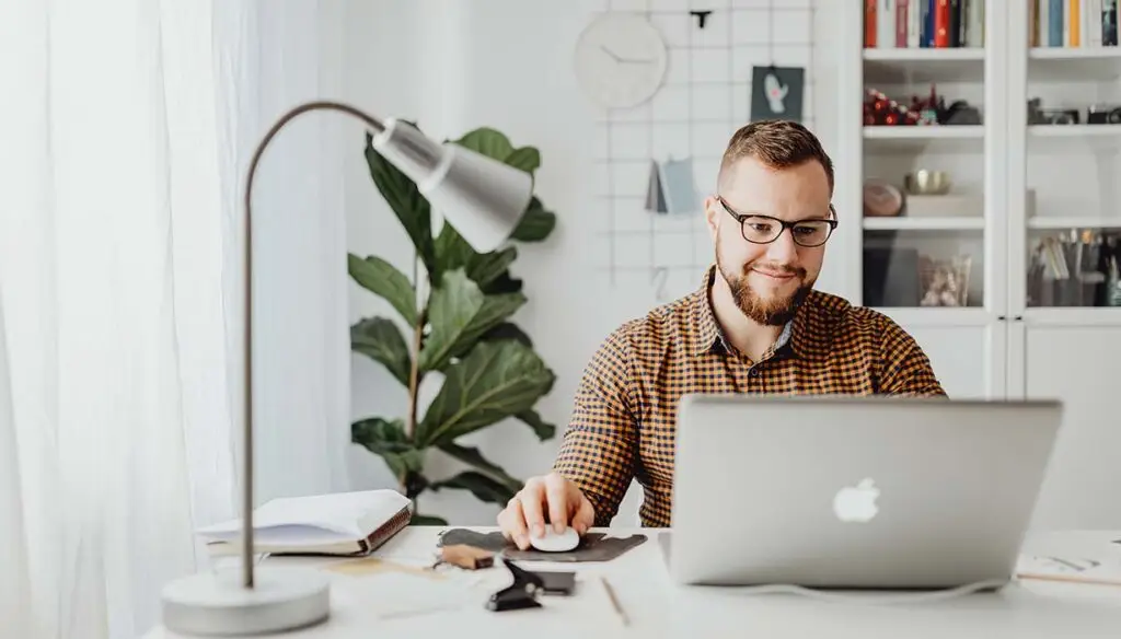 man at home office