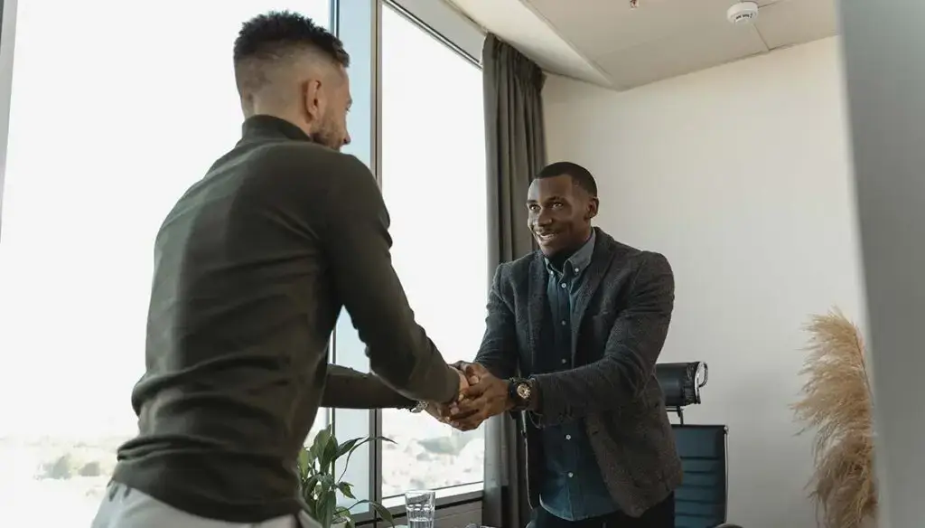 potential worker shaking hands