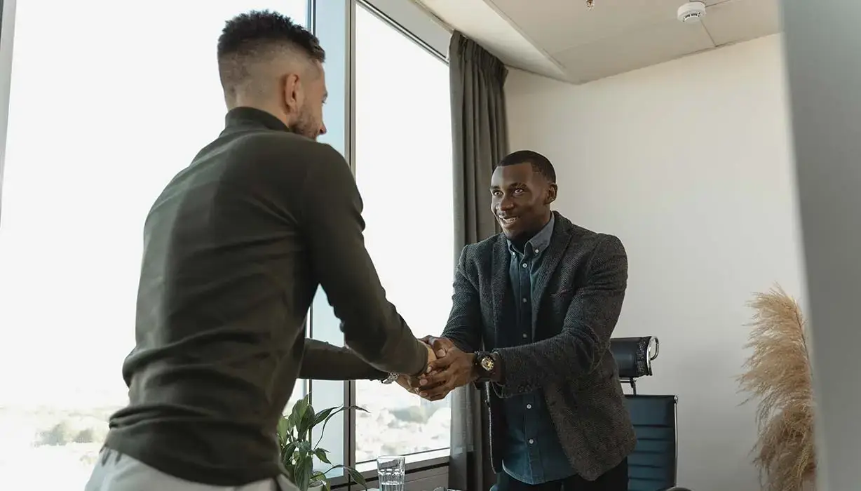 potential worker shaking hands