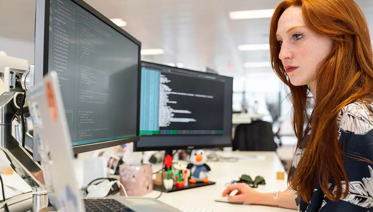 woman looking at monitor