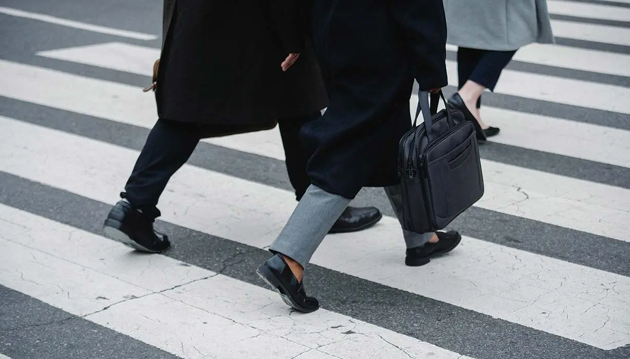 Office workers climbing steps