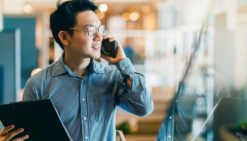 asian man on phone