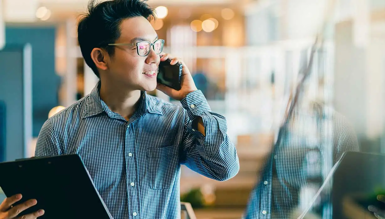 asian man on phone