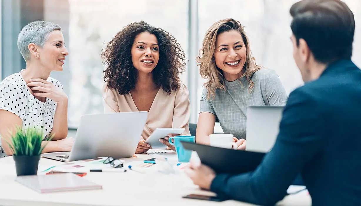 workers discussing outsourcing