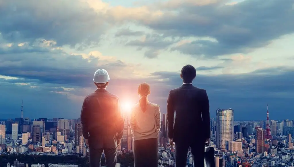 three workers looking at sky