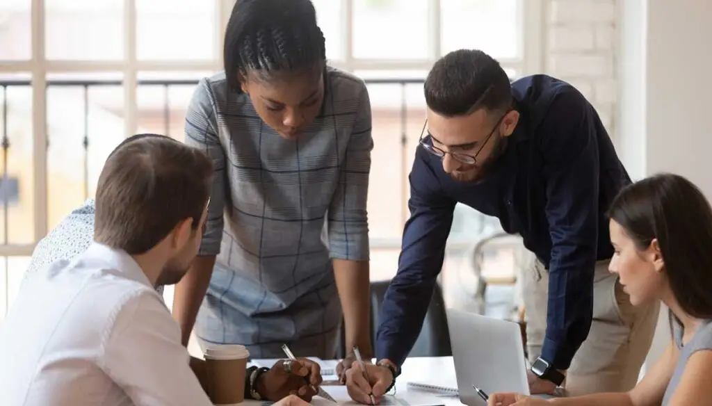 four workers in meeting