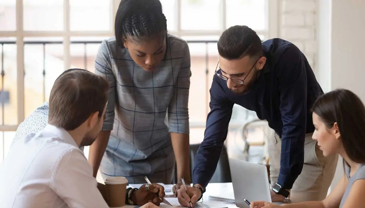 four workers in meeting