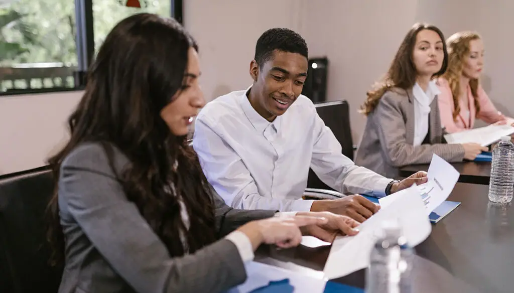 diverse group of employees at table