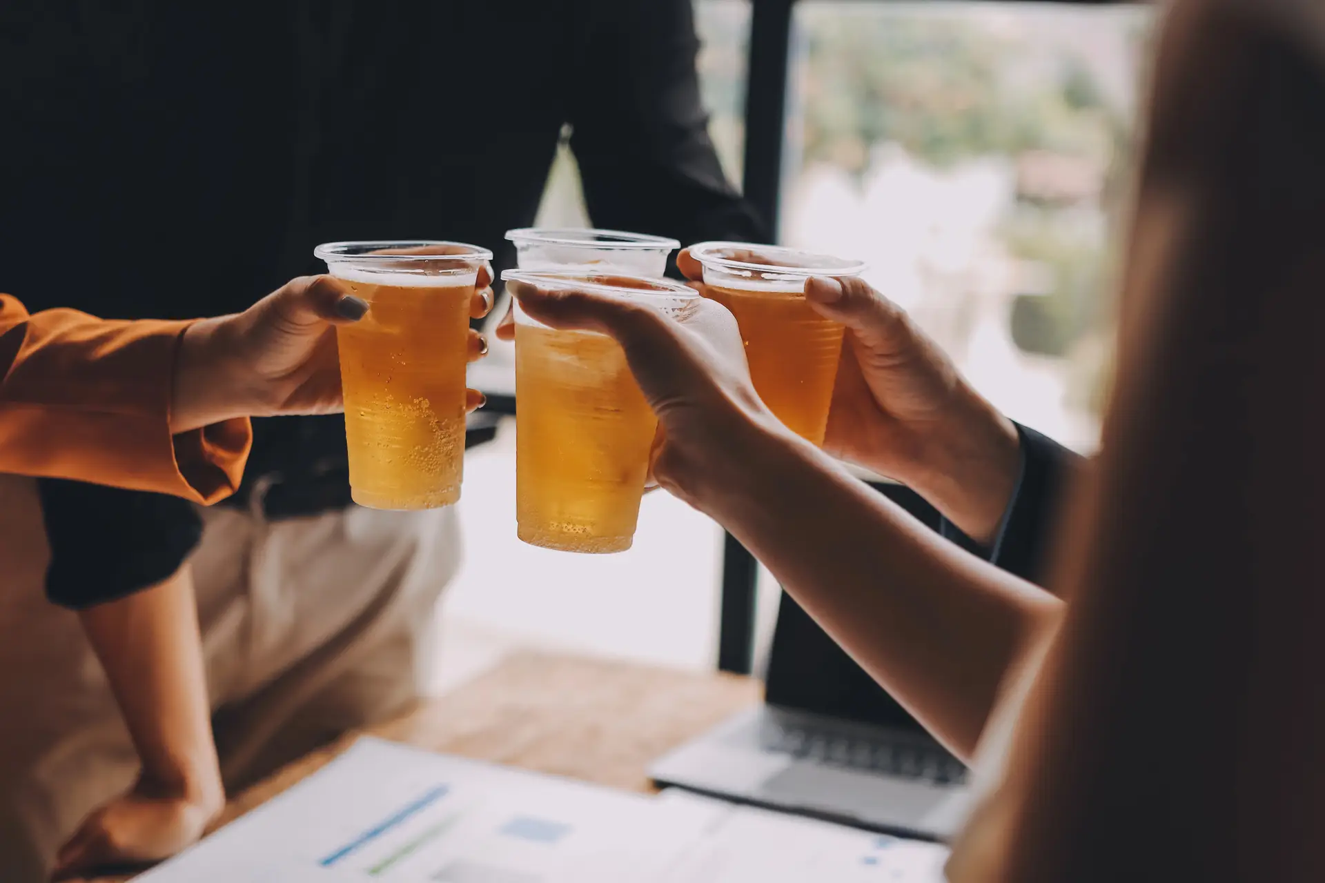 People cheers-ing their drinks