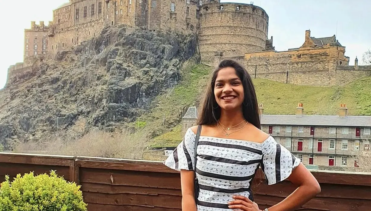 Priya with castle in background