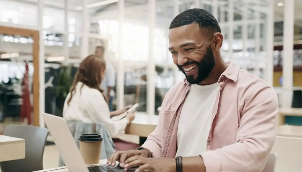 smiling man working in an office